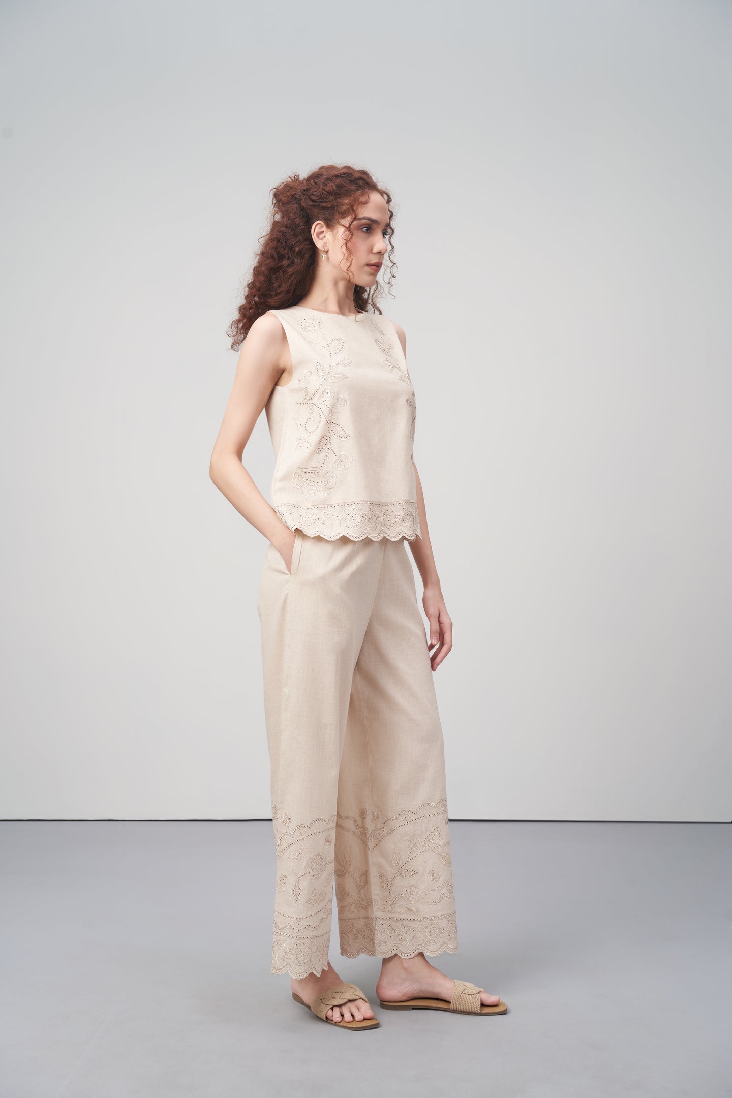 Beige Embroidered Sleeveless Cotton Top For Women Right Side View Model  | Cutwork Embroidery Scalloped Hem Top