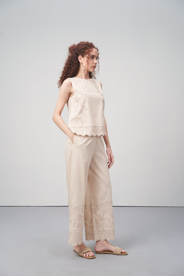 Beige Embroidered Sleeveless Cotton Top For Women Right Side View Model  | Cutwork Embroidery Scalloped Hem Top