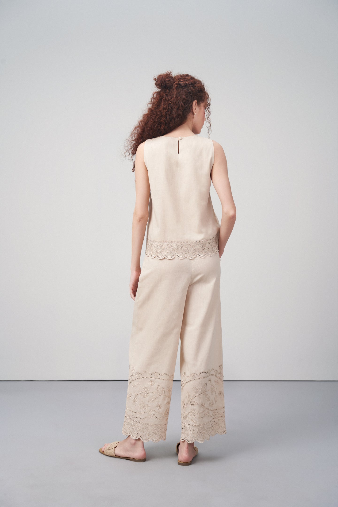 Beige Embroidered Sleeveless Cotton Top For Women Back View Model  | Cutwork Embroidery Scalloped Hem Top