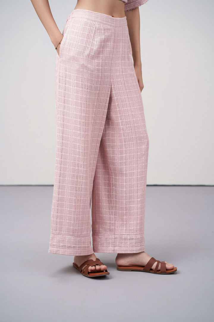 Women Pants 100% Cotton Textured Elastic Waistband Straight Fit Pink Color Trousers  | Pink Cotton Straight-fit Trousers For Women | Fornt Right Side View Cotton Guipure Straight Fit Trousers