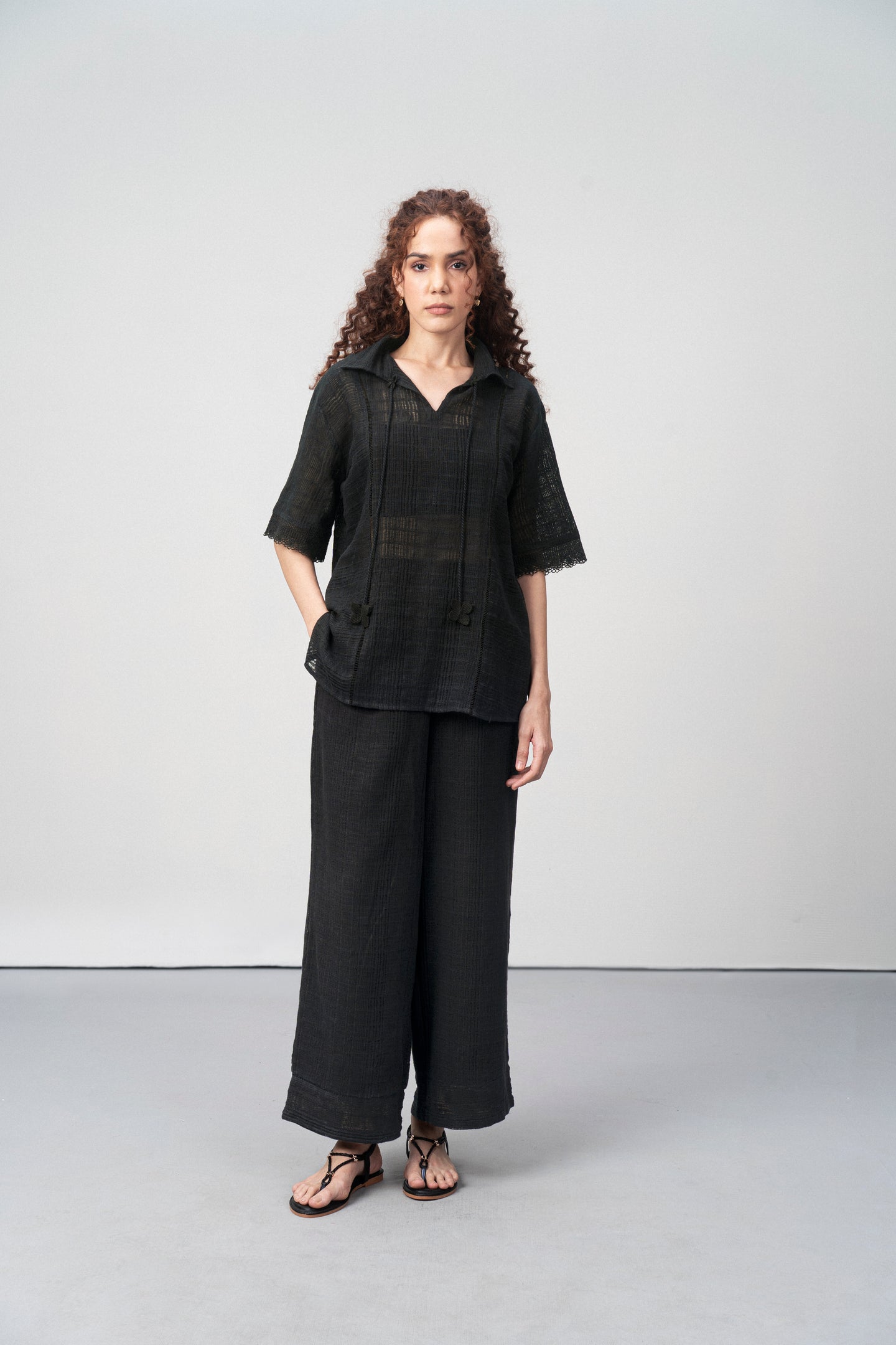 Cotton Black Embroidered Split Neckline Tie Up String Half Sleeve Shirt For Women Ladies full Body View | Black Cotton Guipure V-neck Top For Women