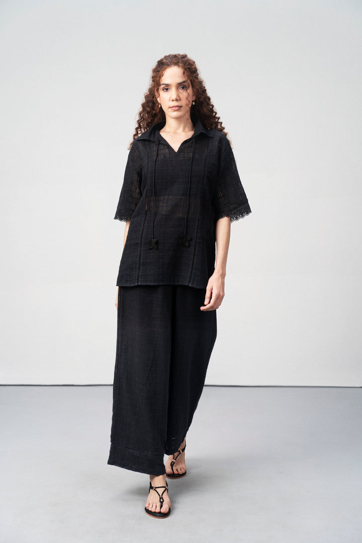 Women Pants 100% Cotton Textured Elastic Waistband Straight Fit Black Color Trousers  | Black Cotton Straight-fit Trousers For Women | Full Body Fornt Side View Cotton Guipure Straight Fit Trousers