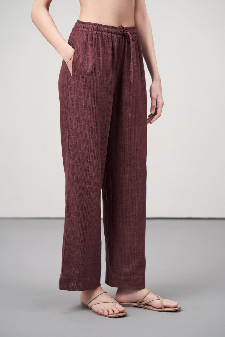 Women Pants Cotton Guipure Textured Straight Fit Elastic Waistband Maroon Trousers Side Pocket View | Deep Rosewood Cotton Straight-fit Trousers For Women | Cotton Guipure Elasticated Waist Trousers