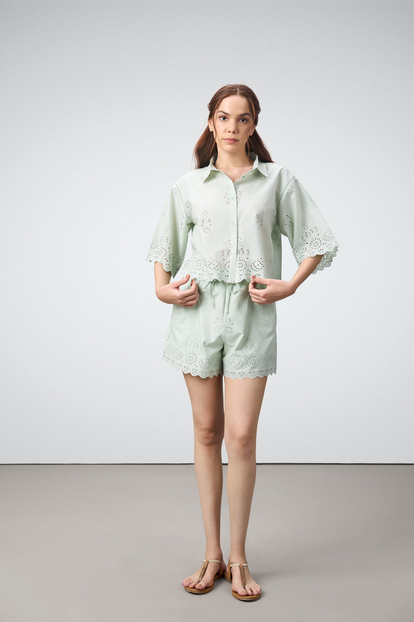 Cotton Highwaist Elastic Drastring Waist Embroidery Anglaise Side Pockets Shorts For Women Ladies Green Color Front Model View | Women’s Broderie Anglaise Cotton Shorts – Light Green Embroidered Shorts