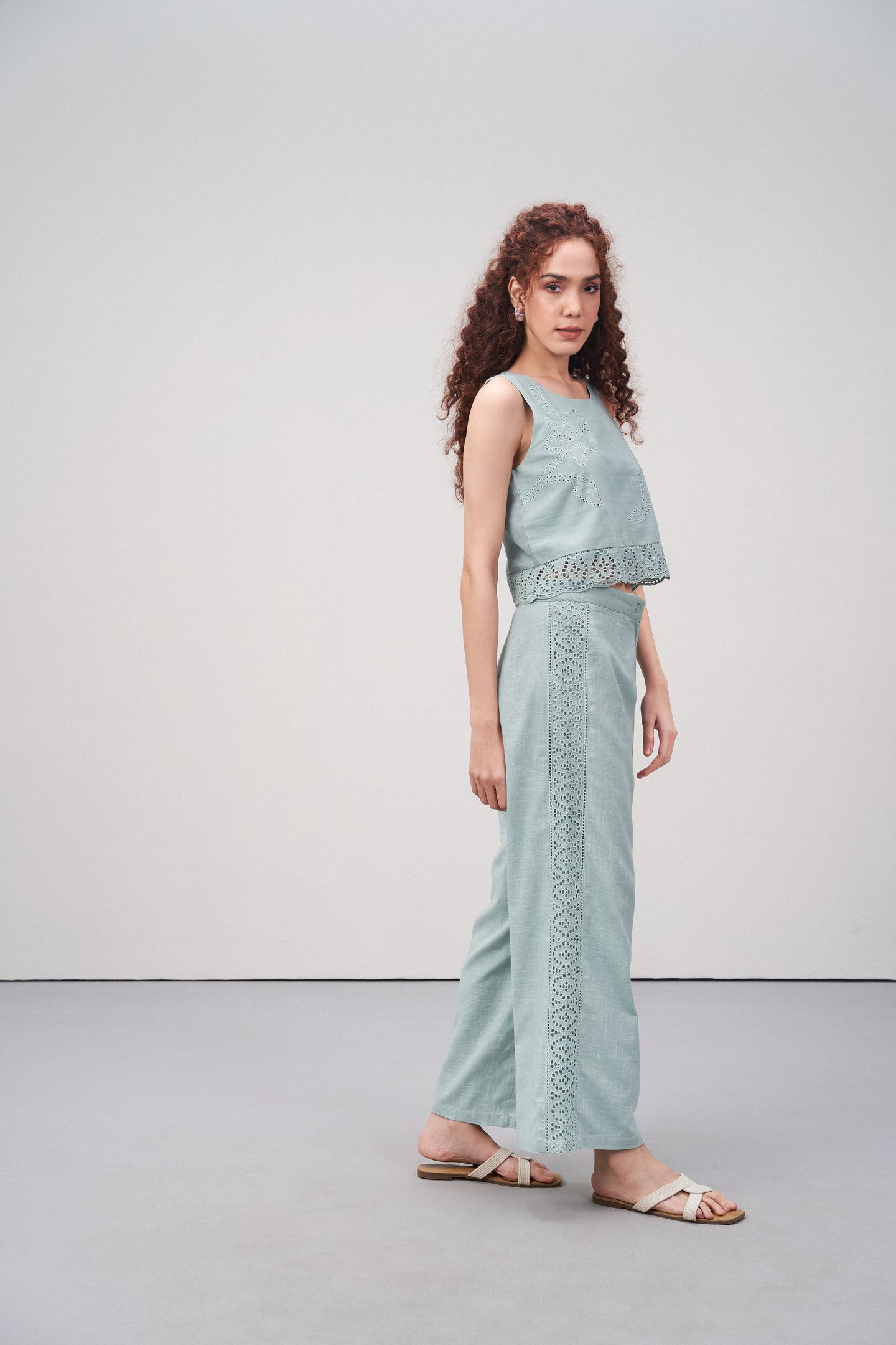 Women Crop Top 100% Cotton Light Green Scalloped Embroidery Lace Hem Sleeveless Top For Ladies Model Side View | Heather Cotton Sleeveless Crop Top With Scalloped Embroidery