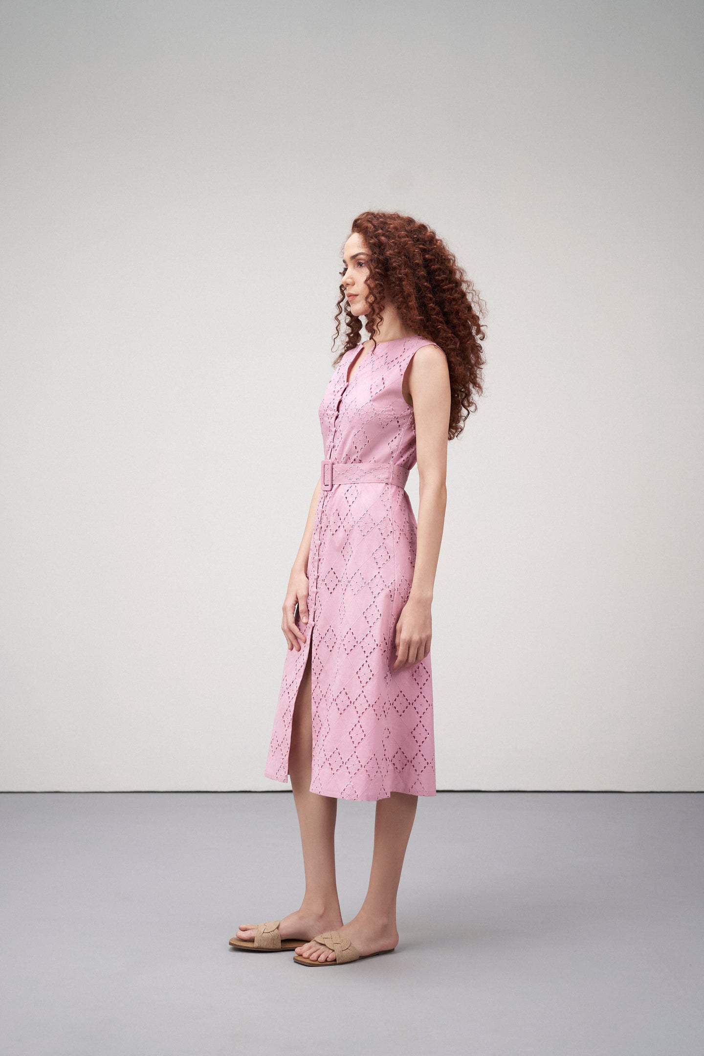 Cotton Embroidered Eyelet Split Neck Sleeveless Dress For Women Ladies Primrose Pink Color Side Model View | Women's Primrose Cotton Sleeveless Relaxed Fit Eyelet Cutwork Dress