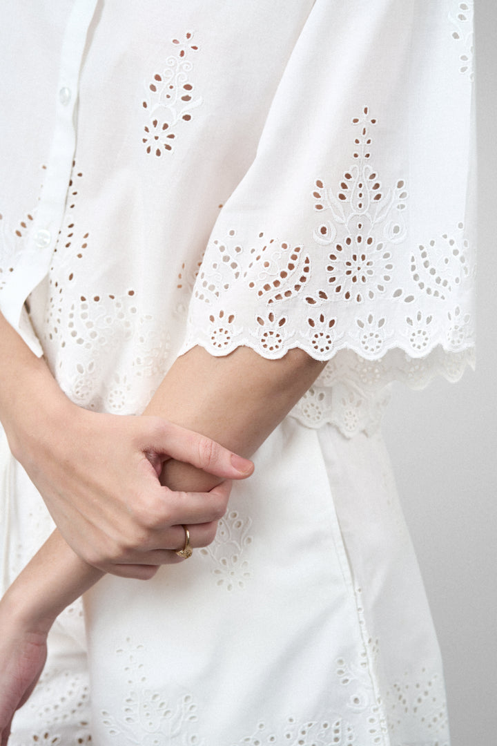 Cotton Cutwork Embroidery Scallop Sleeve Hem White Color Short Sleeve Crop Shirt For Ladies Women Close Sleeve View | White Cotton Eyelet Embroidered Crop Shirt For Women