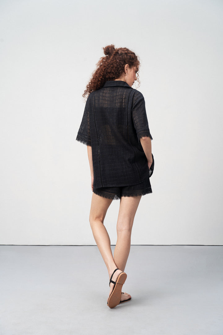 Cotton High Waist Lace Trim Cotton Relaxed Stylish Fit Elastic Waistband Shorts For Women Ladies Black Color Back Model View | Women’s High Waist Black Cotton Shorts With Lace Trim