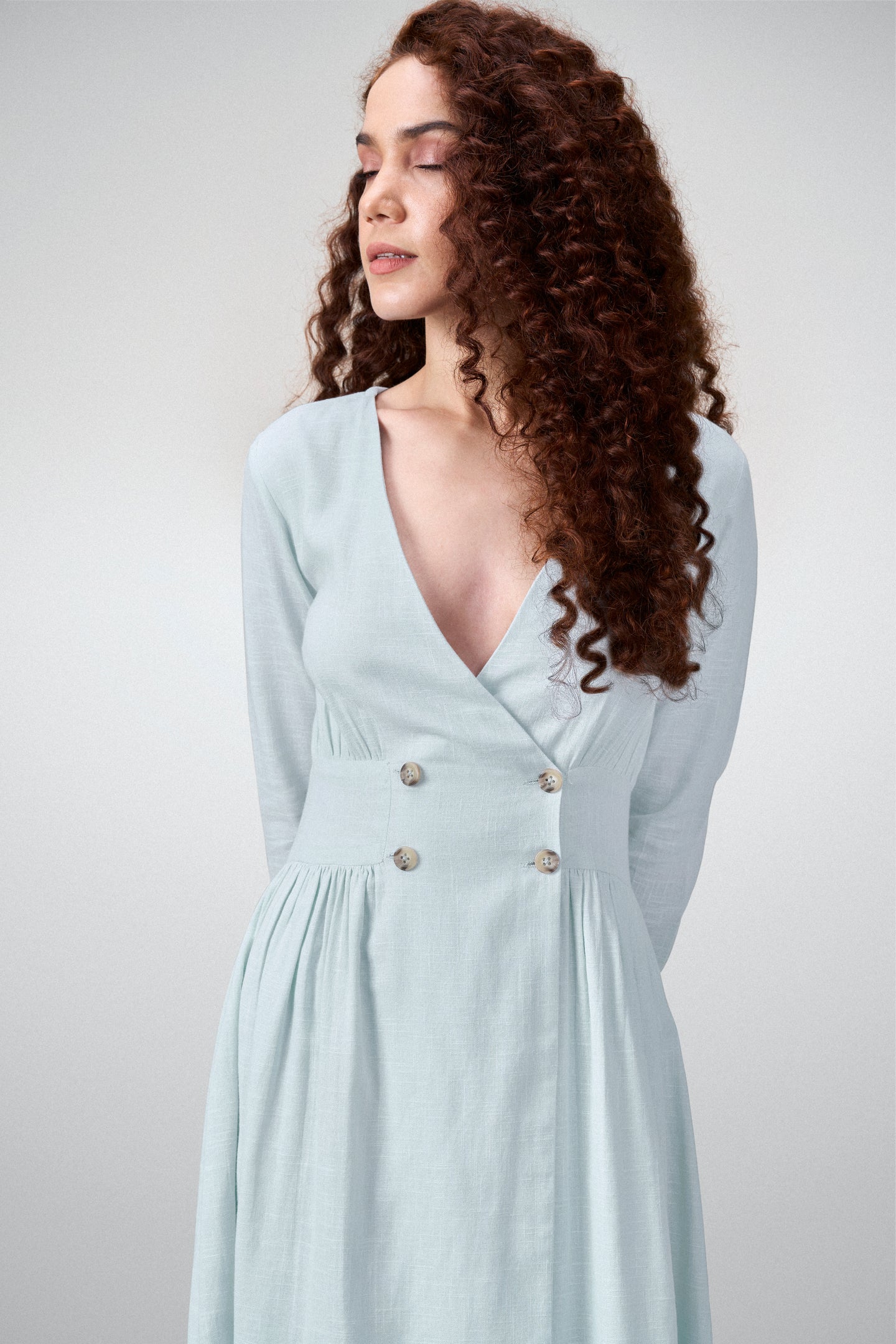 Ladies 100% Cotton Soft And Breathable Long Sleeve V Neckline Blue Color Fit And Flare Midi Dress For Women Model Front Close-up View | Blue Cotton Fit & Flare Midi Dress For Women