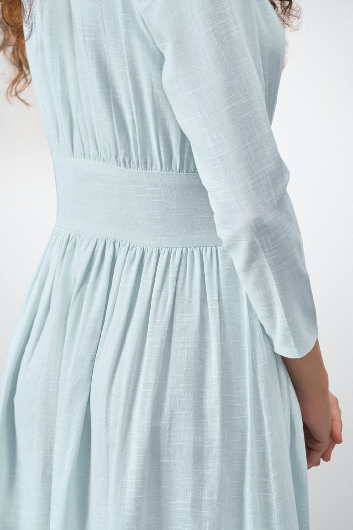 Ladies 100% Cotton Soft And Breathable Long Sleeve V Neckline Blue Color Fit And Flare Midi Dress For Women Model Side Close-up View | Blue Cotton Fit & Flare Midi Dress For Women