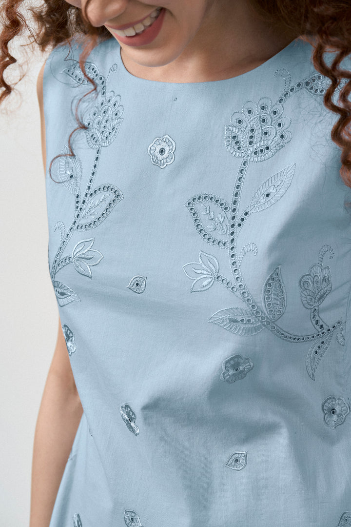 Cotton Round Neckline Sleeveless Embroidered Hem Short Dress For Women Ladies Relaxed Fit Blue Color Embroidery Close-up View | Blue Cotton Sleeveless Mini Dress With Embroidered Hem