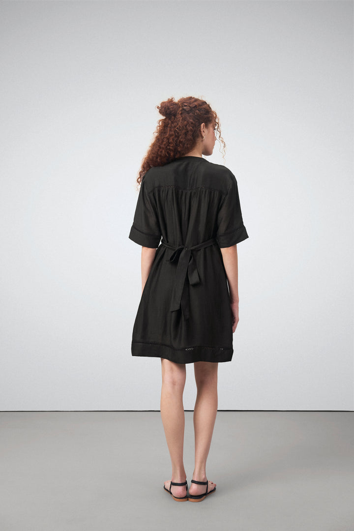 Linen Half Sleeves Adjustable Side Tie Belt Button Front Short Dress For Women Ladies Black Color Back View | Black Linen Blend Relaxed Fit Dress With Mandarin Collar