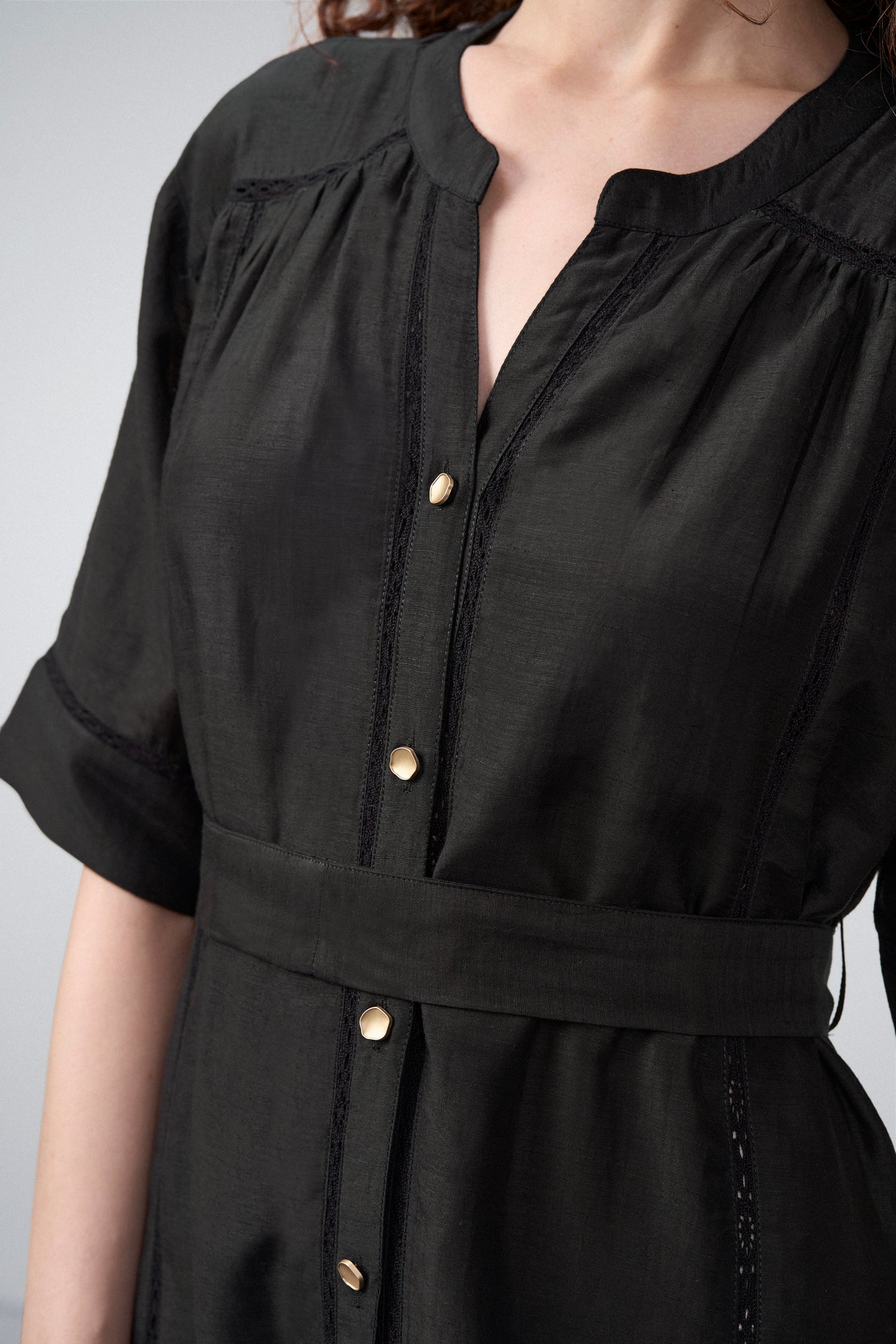 Linen Half Sleeves Adjustable Side Tie Belt Button Front Short Dress For Women Ladies Black Color Model Close-up Front View | Black Linen Blend Relaxed Fit Dress With Mandarin Collar