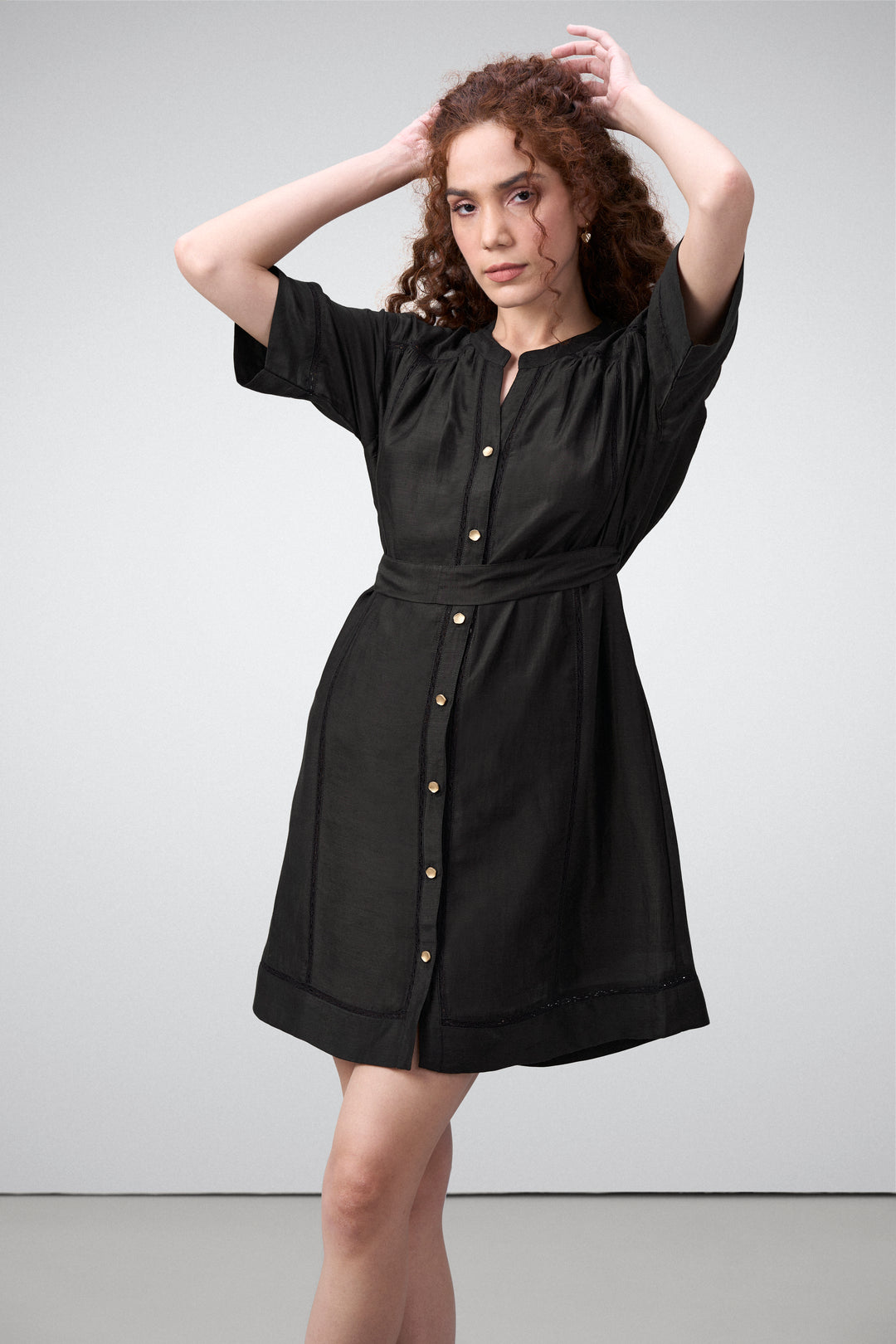 Linen Half Sleeves Adjustable Side Tie Belt Button Front Short Dress For Women Ladies Black Color Model Front View | Black Linen Blend Relaxed Fit Dress With Mandarin Collar
