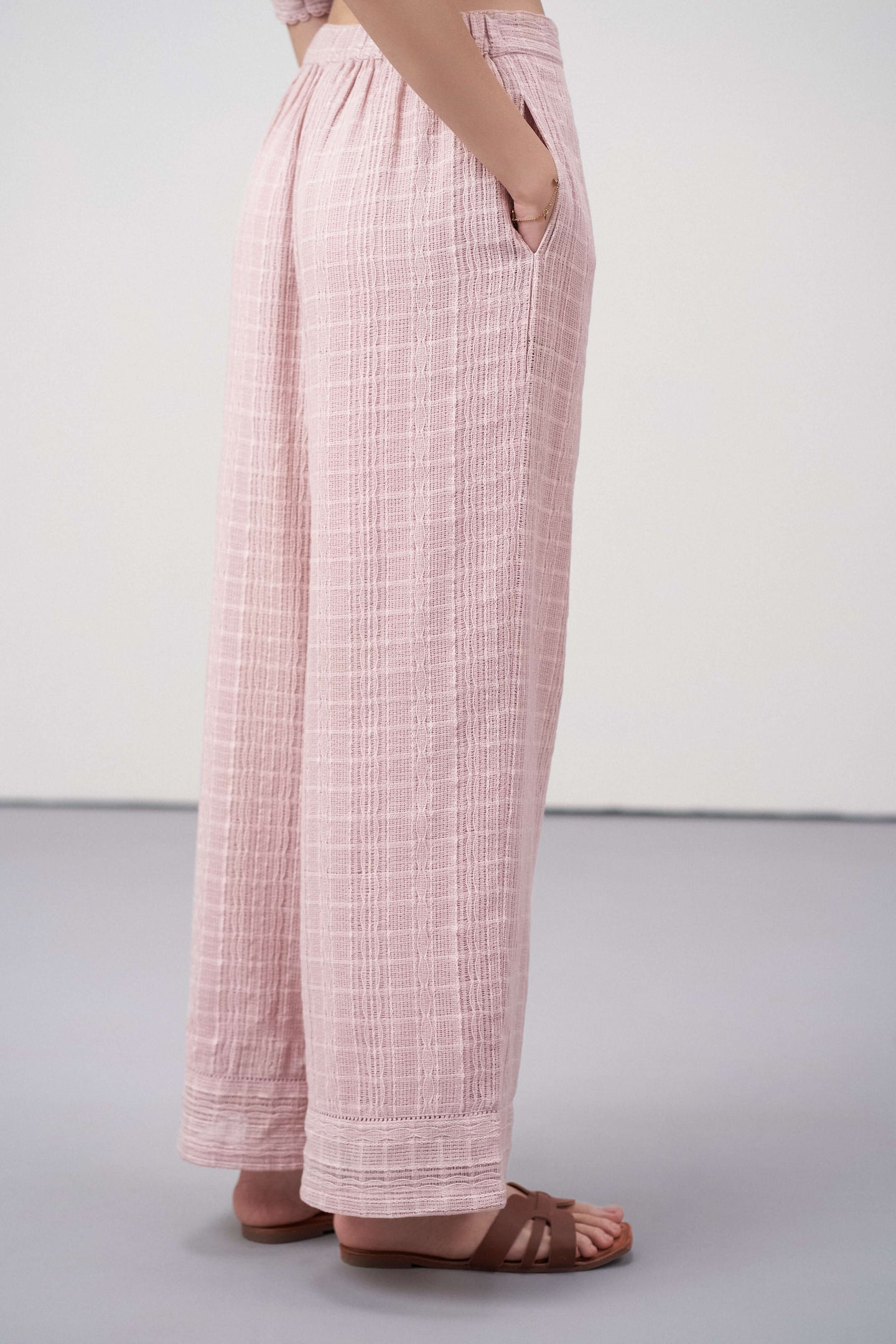 Women Pants 100% Cotton Textured Elastic Waistband Straight Fit Pink Color Trousers  | Pink Cotton Straight-fit Trousers For Women | Full Right Side View Cotton Guipure Straight Fit Trousers