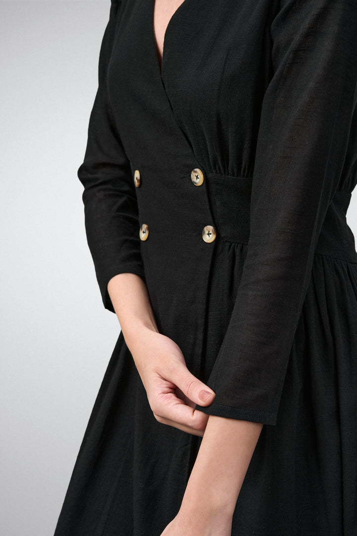 Ladies 100% Cotton Soft And Breathable Long Sleeve V Neckline Fit And Flare Midi Dress For Women Model Fonrt Left Hand Side View | Balck Cotton Fit & Flare Midi Dress For Women 