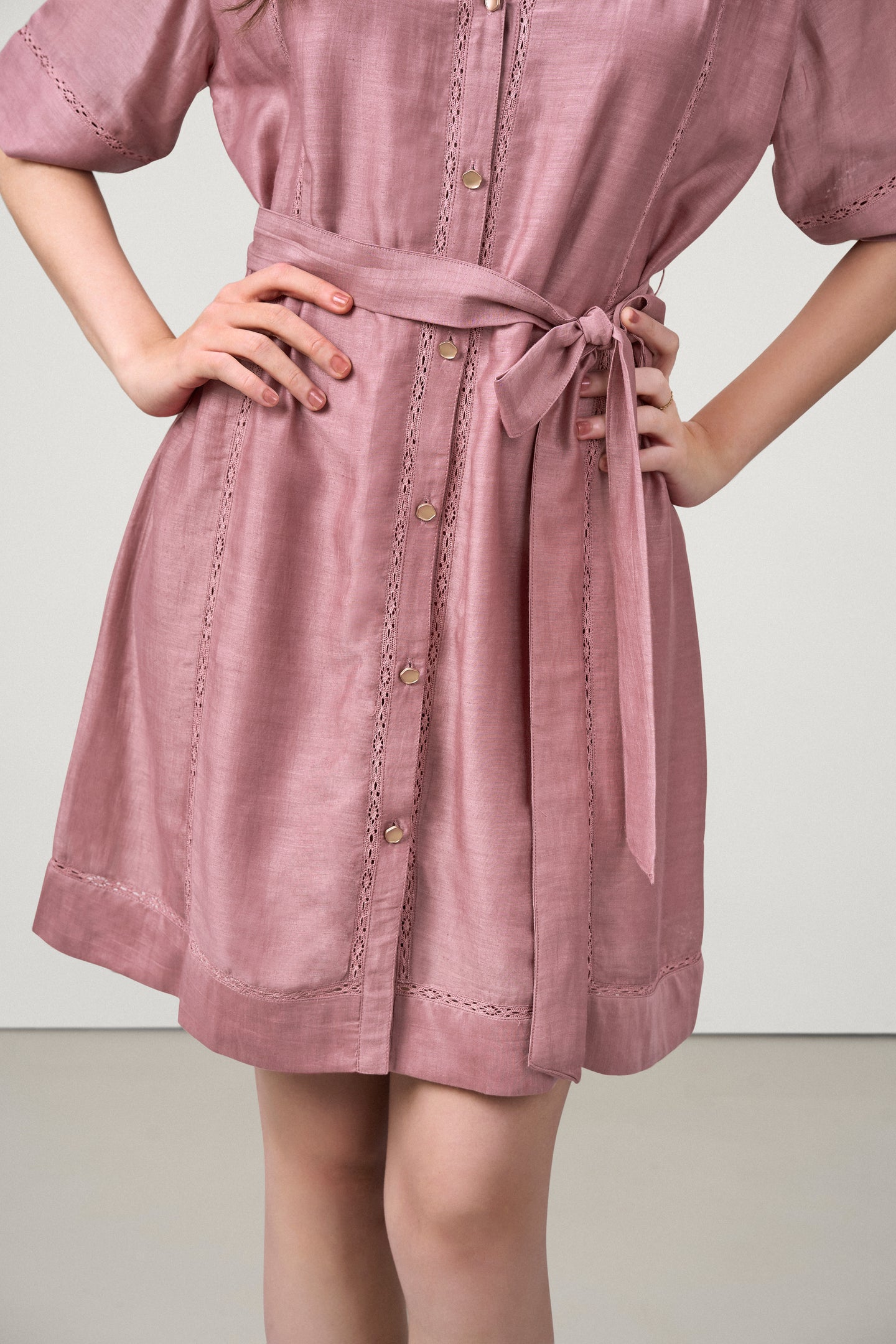 Linen Half Sleeves Adjustable Side Tie Belt Button Front Short Dress For Women Ladies Pink Color Model Front View | Pink Linen Blend Relaxed Fit Dress With Mandarin Collar
