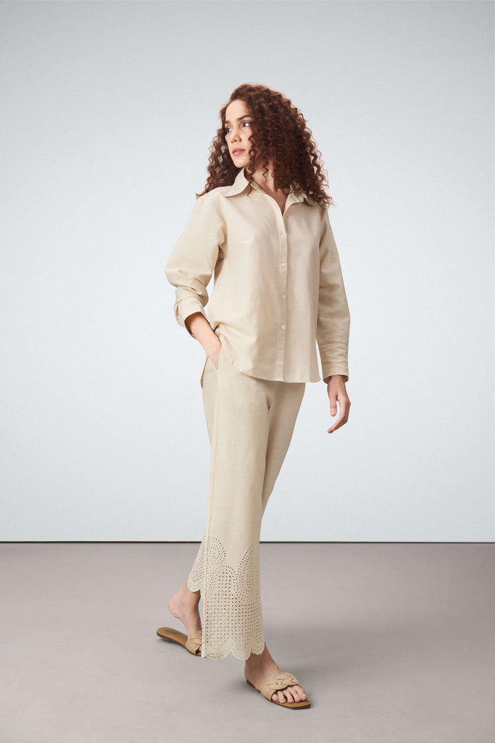 Women Shirt Classic Long Sleeve Button-up Eyelet Embroidery Beige Color Shirt For Ladies Model Side View | Beige Eyelet Embroidered Cotton Shirt For Women – Long Sleeve & Breathable