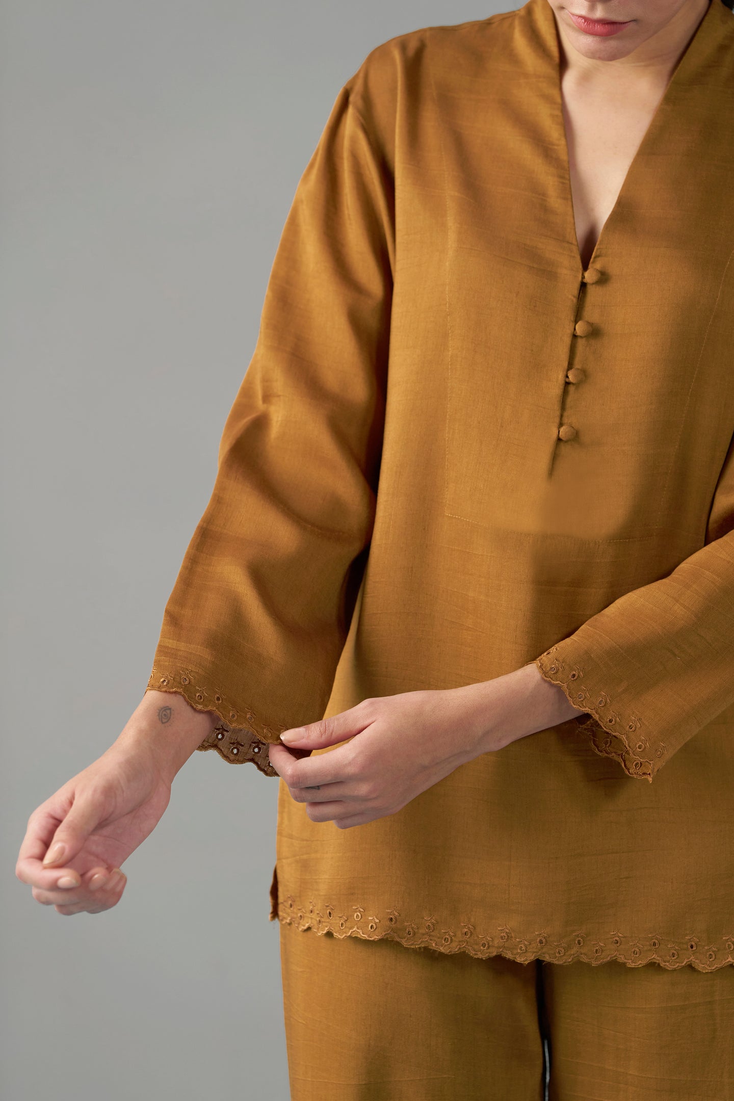 Women Musturd Embroidered Scalloped Hem sleeve side design view | fancy tops for women​
