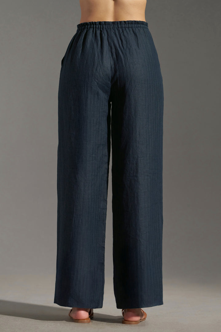 Navy Blue relaxed fit elastic trousers for women | backside full view