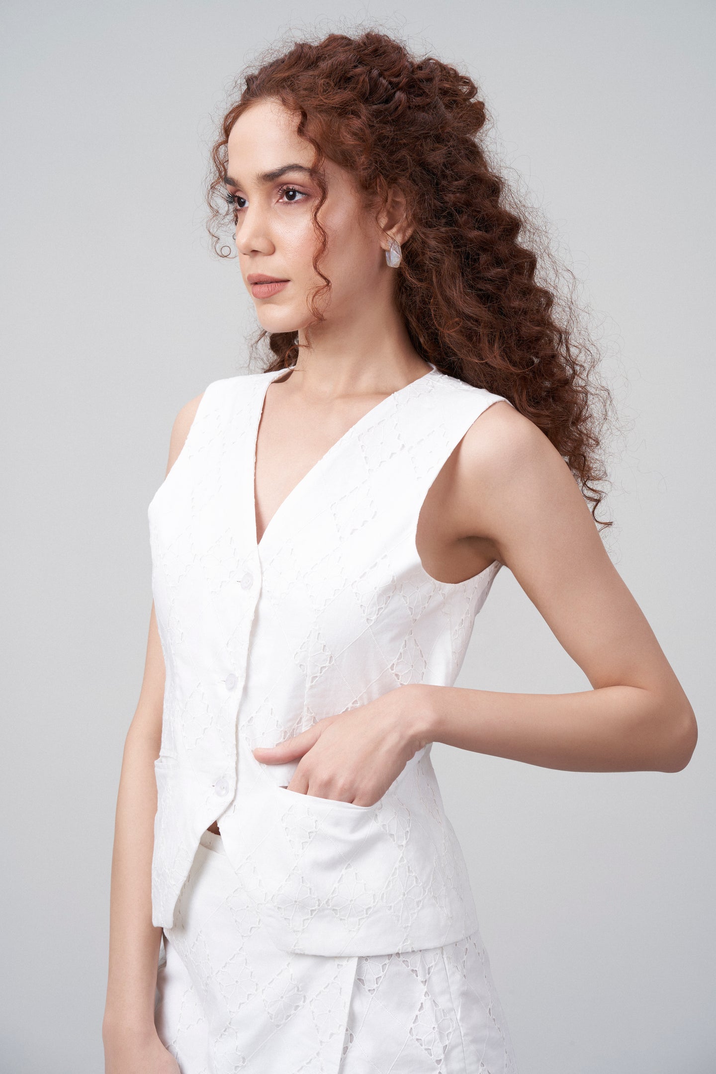 White Cotton Eyelet Embroidered Waistcoat For Women | Eyelet Embroidery Waistcoat for Front Pocket Model View
