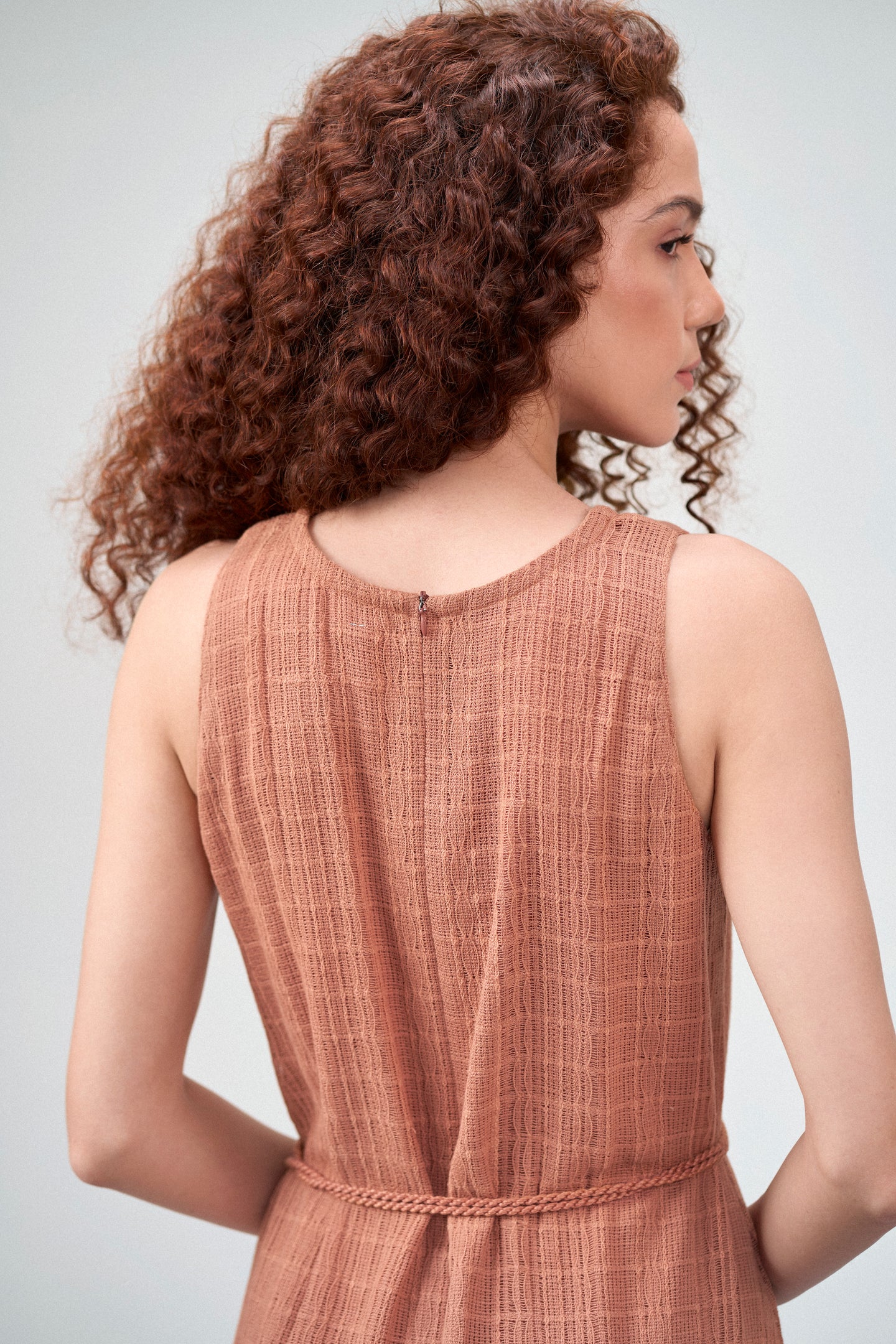 Cotton Guipure Sleeveless Round Neckline Floral Accents Bloom Midi Dress For Women Ladies Terracotta Color Model Close-up Back View | Terracotta Guipure Bloom Midi Dress | Cotton Midi Dress For Women
