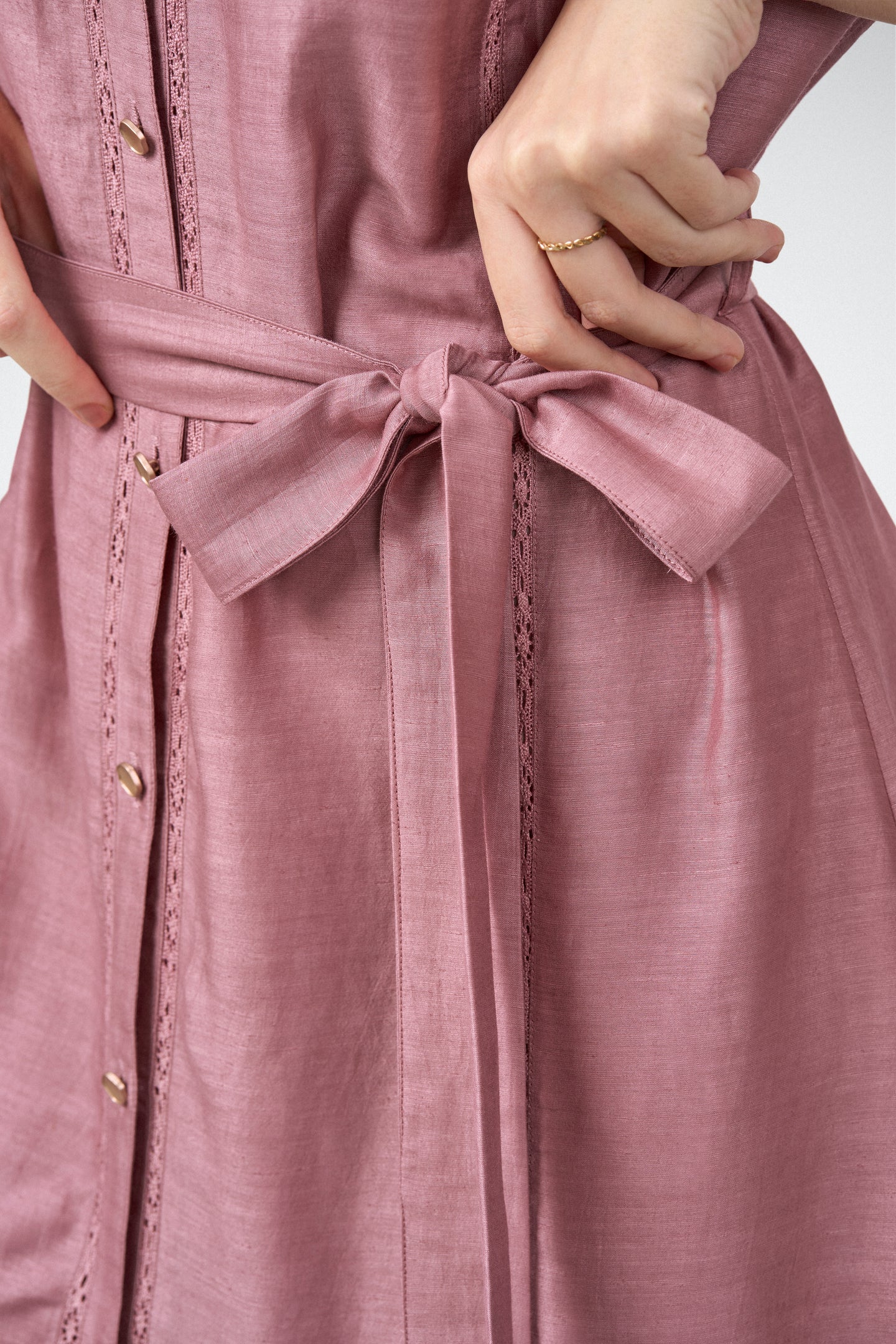 Linen Half Sleeves Adjustable Side Tie Belt Button Front Short Dress For Women Ladies Pink Color Model Side View | Pink Linen Blend Relaxed Fit Dress With Mandarin Collar
